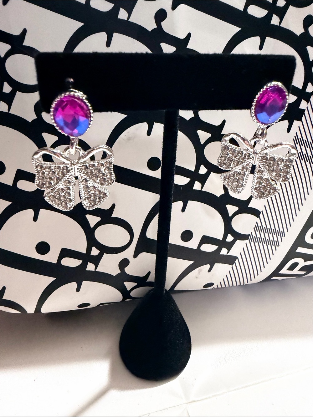 Silver Bow Drop Earrings with Pink-Purple Crystal Stud